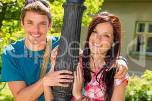 Happy young lovers smiling