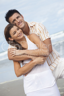 Man and Woman Couple Embracing On A Beach