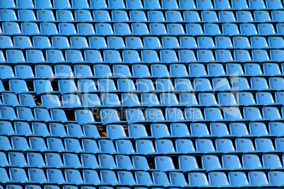 Empty Blue Stadium Chairs