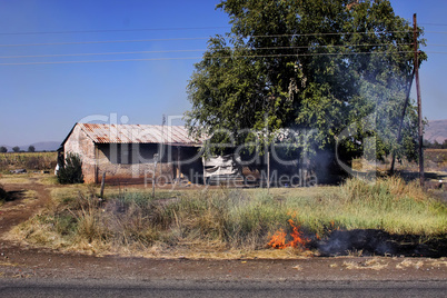 Felt Fire Close to Farm House