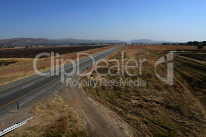 Open Freeway with Sand Road Junction