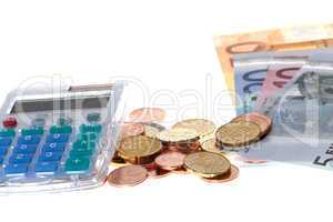 Taschenrechner mit Geldscheinen und Münzen