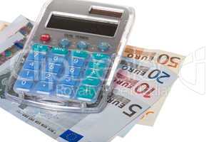 Taschenrechner mit Geldscheinen