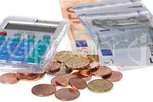 Taschenrechner mit Geldscheinen und Münzen