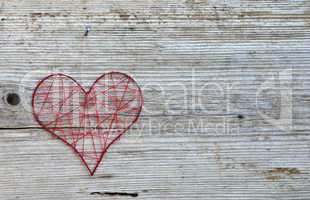 Herz  auf altem Holz Hintergrund