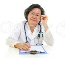 Asian senior female doctor