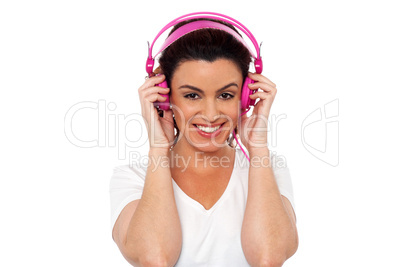 Young brunette enjoying music
