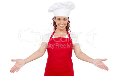 Smiling woman chef welcoming you