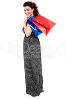 Full length portrait of shopaholic woman