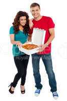 Young couple about to enjoy pizza together