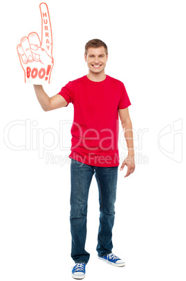 Casual guy showing large pointy boo hurray hand