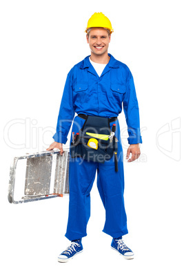Construction worker ready with stepladder