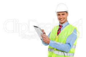 Construction engineer operating wireless device
