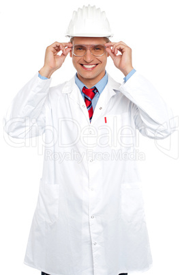 Smiling architect holding eyeglasses