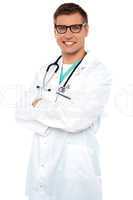Confident physician posing with arms crossed