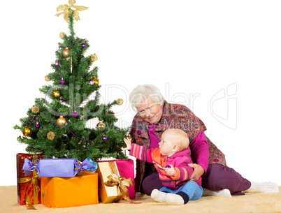 Granny and baby with Christmas tree