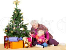 Granny and baby with Christmas tree