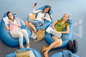 Group of students relax on beanbag