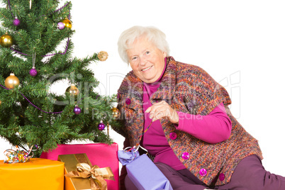 Happy grandmother preparing for Christmas