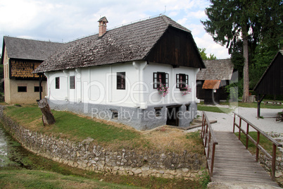 Wooden bridge and house