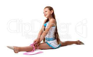 child doing split with skipping rope isolated