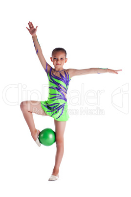 young gymnast stand with green ball