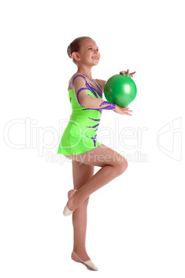 young child gymnast dance with green ball