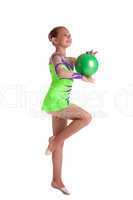 young child gymnast dance with green ball