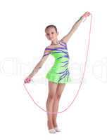 Young child gymnast posing with skipping rope