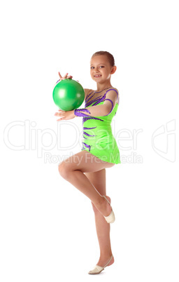 Happy girl stand with green gymnastic ball