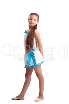 Young child posing full height in studio portrait