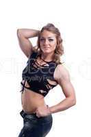 perfect woman body builder posing in fashion cloth