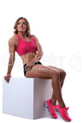 Beauty strong woman with muscle body lay