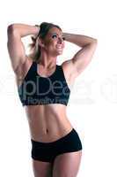 Athletic woman body builder posing isolated