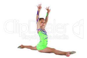 Young teen gymnast doing split in green costume