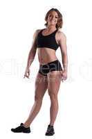 Strong woman full height body builder isolated