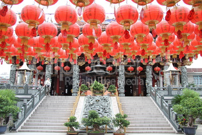 A lot of red lamps and old chinese temple