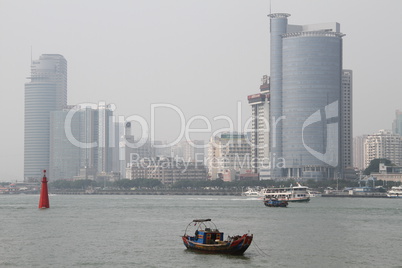 Boat and skyscrepers in Xiamen