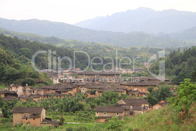 Chinese village with tulou in China