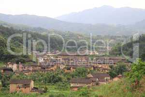 Chinese village with tulou in China