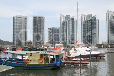 Wooden boat and new buildings