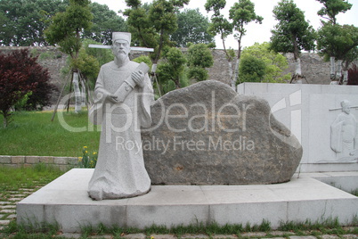 Monument of chinese emperor on the bank