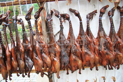 Smoked ducks on the ropes