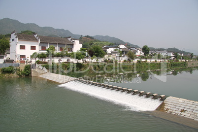 Dam and river in Shexizn town, China