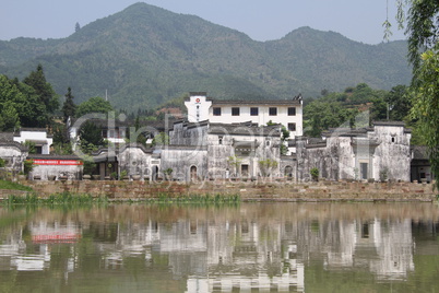 White houses near the lake in Shexian