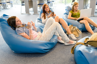 Group of students relax on beanbag