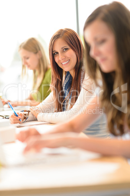 Happy students in classroom