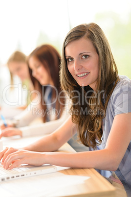 Happy students in classroom