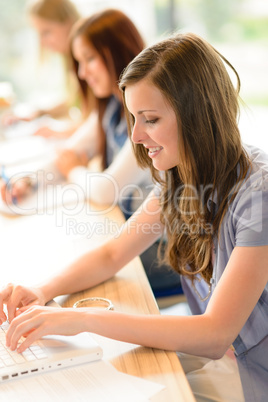 Happy students in classroom