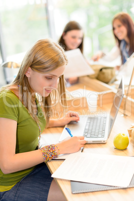 Young girl studying at high school